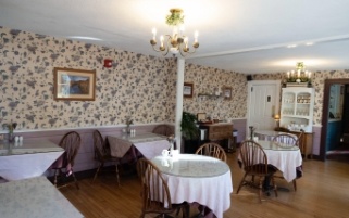 Dining room with antique wallpaper
